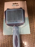 Bliss Pet Paw-some Self Cleaning Bristle Slicker Brush For Regular Dogs. Fixed Price $13.00.