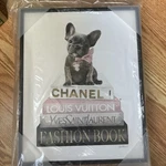 Stupell Industries Dashing French Bulldog And Iconic Fashion Bookstack Wall Art. Fixed Price $25.00.