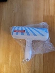Takarabox Pet Hair Remover Reusable Lint Roller W/ Base For Furniture, Red. Fixed Price $6.99.