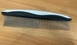 Grip Ease Wide And Narrow Tooth Grooming Pet Comb Black White. Fixed Price $10.00.