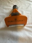 Furminator Medium Dog Undercoat Deshedding Tool, Long Hair, Reduces Loose Hair. Fixed Price $9.00.